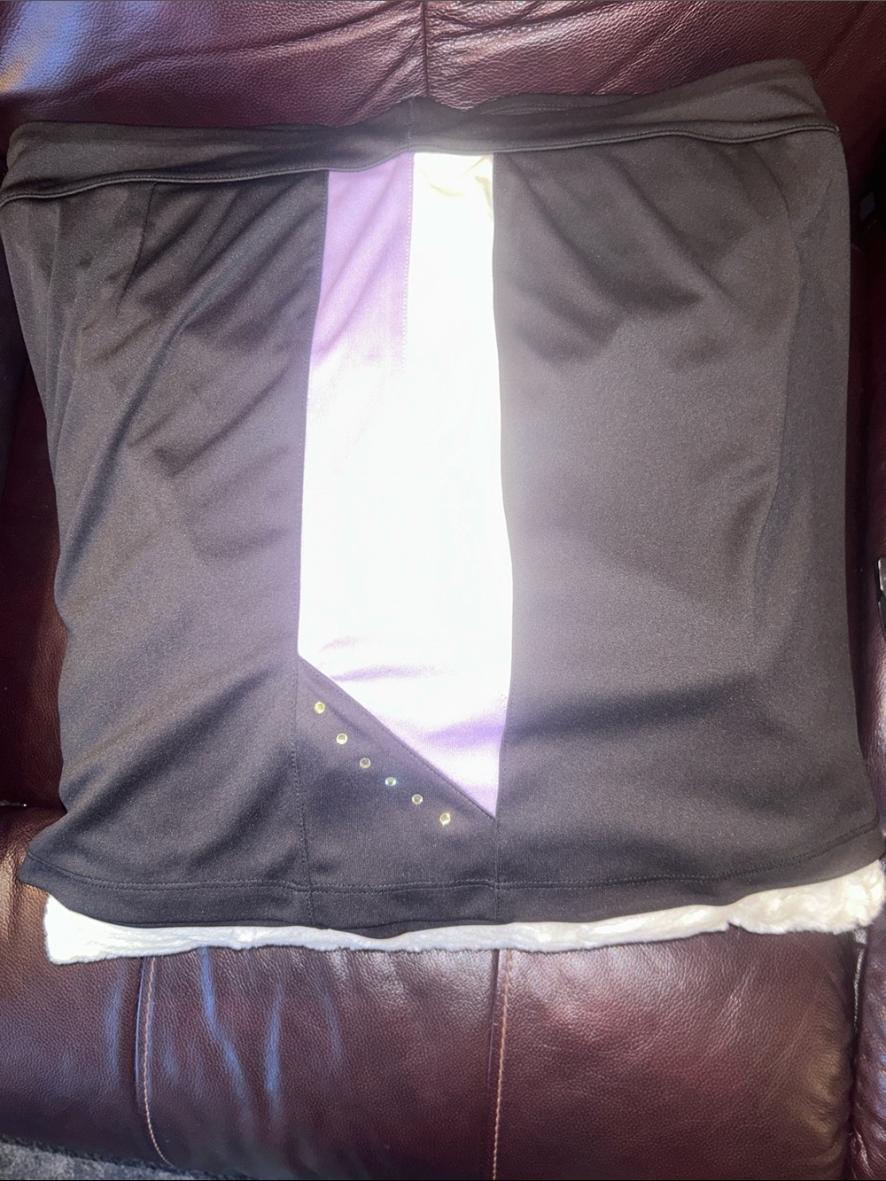 Izod Black Skort with White & Purple on each side w/ rhinestones. Size Medium